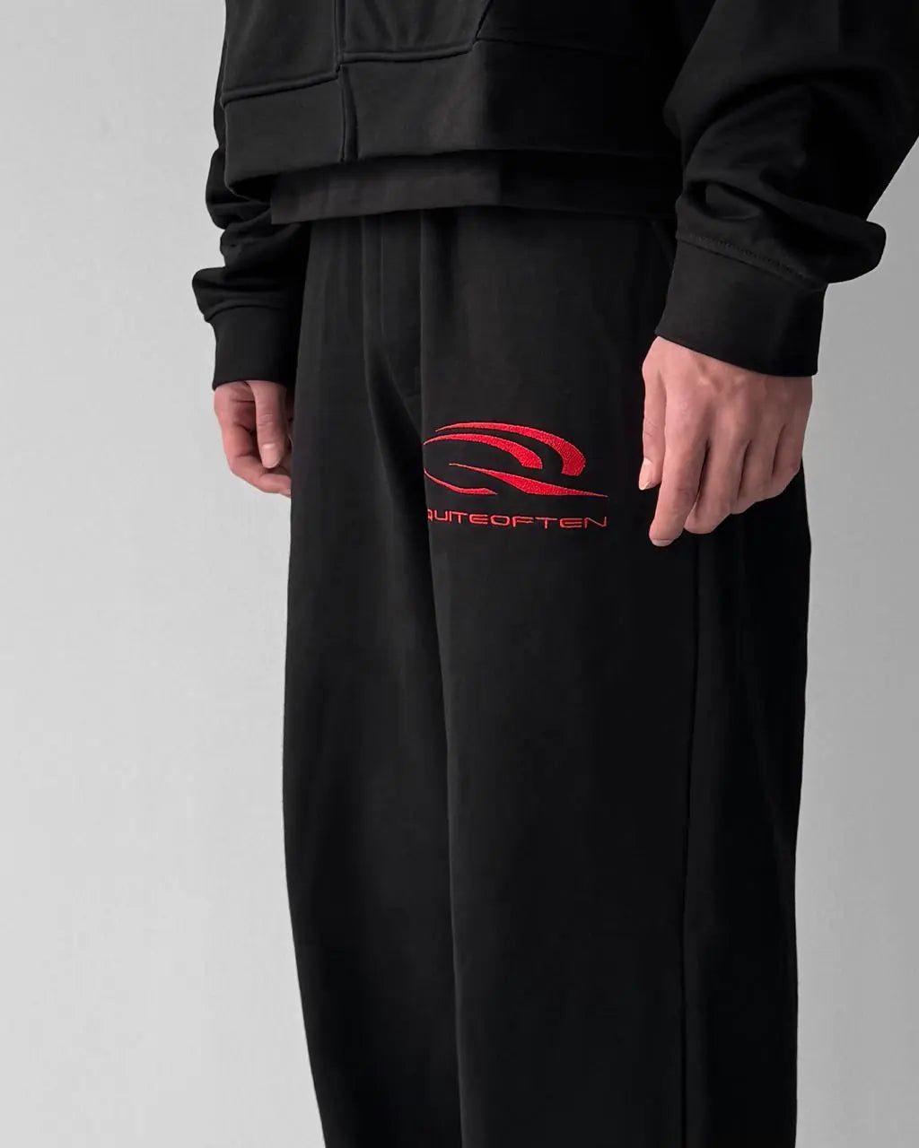 RED ON BLACK SPORTS LOGO SWEATPANTS